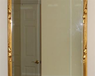 Gilded mirror.