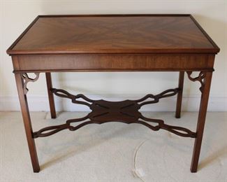 Occasional table, that measures, 20" D x 32" W x 25" H.