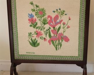 Beautifully needle pointed fire screen. I love the colors of this piece.