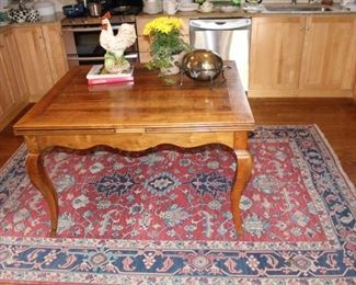 French country farm table measures 39 1/2" W x 47 1/2" L ( with leaves extended on each end) length is 89 1/2" L.