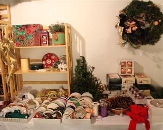 This large storage room is full of books, ribbon, Christmas decor and more.