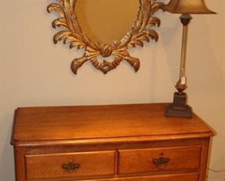 Pine chest, mirror and lamp.
