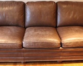 Top of the line! Hancock Moore Bryan brown leather sofa. Measures 84" wide with silver toned tacks.