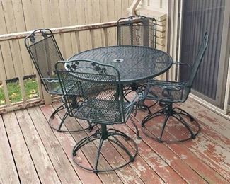 Dark Green Metal Open Mesh 42 in. Patio Table with 4 Spring Rocking Chairs