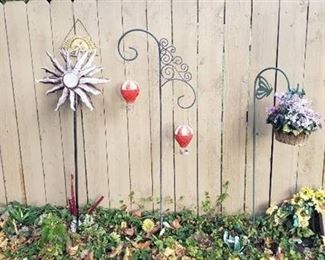 Lot of Outdoor Decor - 2 Sheperd hooks, 1 Whirling, and Welcome hanger - tallest one: 70 in.