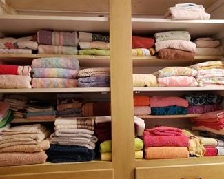 Large Lot of Towels in Top of Linen Closet