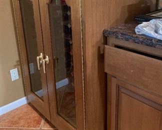 100 bottle Vinotemp Oak Wine Cooler 49x37.5x28.5 HxWxD Very expensive when new!!.. Keeps accurate temperature. Compressor was replaced 8 mo ago!!!