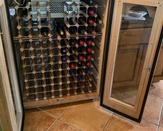 100 bottle Vinotemp Oak Wine Cooler 49x37.5x28.5 HxWxD Very expensive when new!!.. Keeps accurate temperature. Compressor was replaced 8 mo ago!!!
