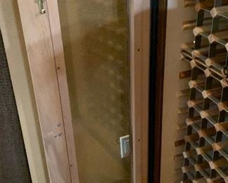 100 bottle Vinotemp Oak Wine Cooler 49x37.5x28.5 HxWxD Very expensive when new!!.. Keeps accurate temperature. Compressor was replaced 8 mo ago!!!