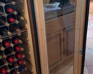 100 bottle Vinotemp Oak Wine Cooler 49x37.5x28.5 HxWxD Very expensive when new!!.. Keeps accurate temperature. Compressor was replaced 8 mo ago!!!
