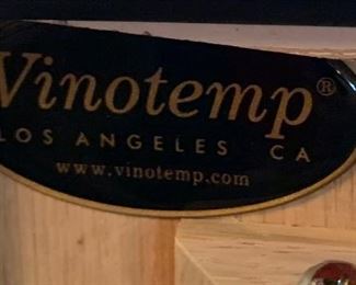 100 bottle Vinotemp Oak Wine Cooler 49x37.5x28.5 HxWxD Very expensive when new!!.. Keeps accurate temperature. Compressor was replaced 8 mo ago!!!