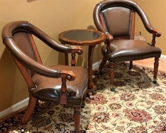 #1 Leather Nailhead Barrel Back Chair 36x26x26in HxWxD
#2 Leather Nailhead Barrel Back Chair 36x26x26in HxWxD