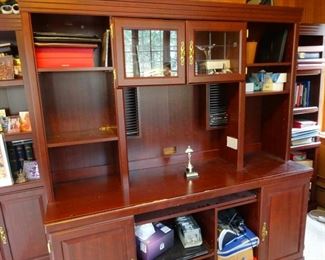 Office shelves and storage cupboards, with computer keyboard sliding pull-out.