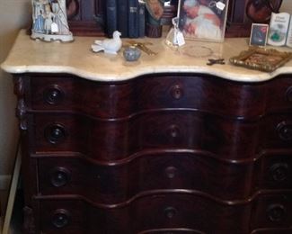 Bottom of the dresser, top was the precious picture.  Notice the bow front drawers and the marble top