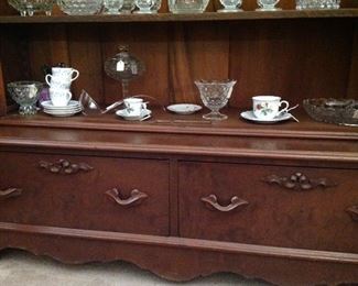 Notice the deatails on the bottom of the large China cabinet.  It has two large lockable drawers