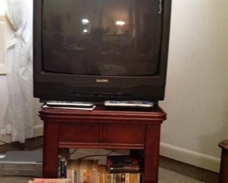 TV, nice side table (all wood),  small part of the paperback books available 