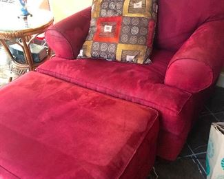 Comfy red chair with ottoman I will be sleeping on this at the end of the day