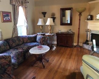 wide shot of nice living room love that fireplace