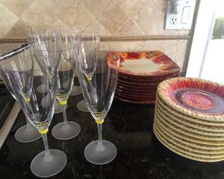 champagne glasses and plates made of mashed flowers