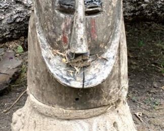 Weathered Wooden Sculpture on Cement Base