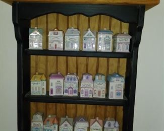 Spice rack full of vintage spice jars