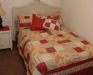 Wicker bedroom set which includes bed, nightstand, dresser and mirror