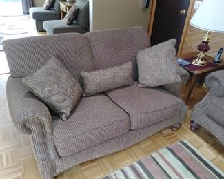 One of two piece matching fabric loveseat and couch