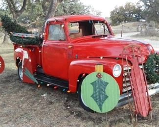Red yard art truck