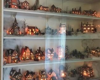 Lots of Dept 56 items.  Cottages, people, trees, clock, and more...have boxes for most all of it.  