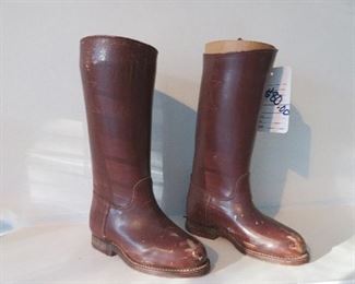 You can’t really tell but these are small Child’s riding boots in the Library