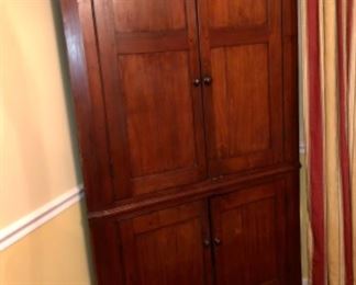 1840’s Montgomery County TN made walnut corner cabinet. One of two corner cabinets that were divided by family at the Governors death. There is also a walnut drop leaf table.