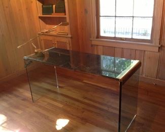 Glass desk and lamp.