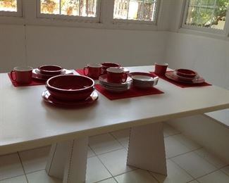 Red dishes and placemats for everyday.