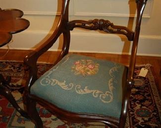 Needlepoint and carved arm chair