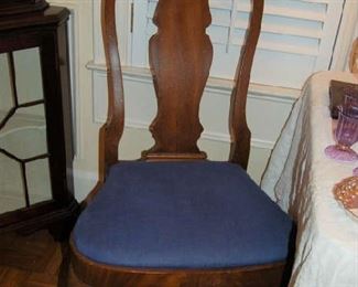 One of six Queen Anne-style dining chairs