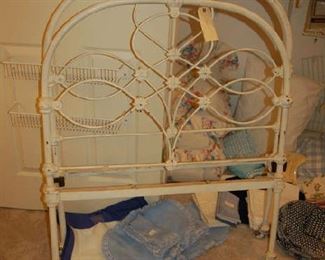 Antique child's iron bed