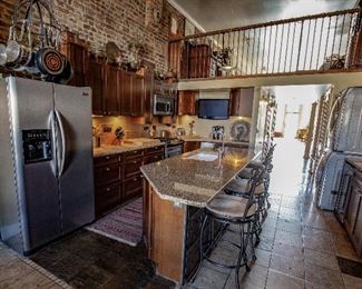 Bar stools, Stainless Refrigerator, Samsung Washer Dryer 