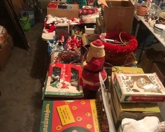 Tables full of vintage Christmas items 