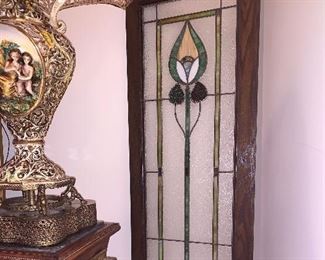 Pair of Beautiful Stained glass windows - 4'9"t  X  17-1/2"w - is on has a crack on the bottom of glass