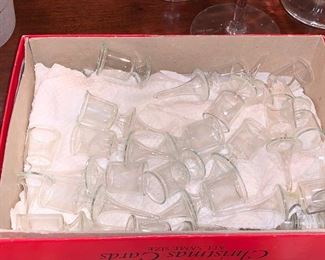 Dozens of mini glass candles holders - about the size of Birthday candles - there's more than what's shown here