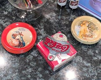 Coasters and Coca-Cola bottle opener