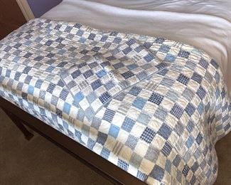Blue and white quilt and pillow sham
