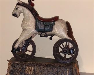 Vintage Bible and horse on wheels 