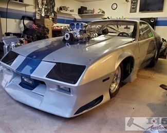50: 1984 Chevy Camaro IROC Dragster with Engine and Trans
BDS 14 Blower, Edelbrock Victor aluminum heads, windows are new/never raced, and much more!
 	 