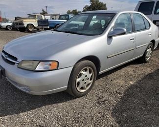 	
1999 Nissan Altima
Year: 1999
Make: Nissan
Model: Altima
Vehicle Type: Passenger Car
Mileage: {ENTER MILEAGE HERE}
Plate: {ENTER PLATE NUMBER HERE}
Body Type: 4 Door Sedan
Trim Level: SE; XE; GLE; GXE
Drive Line: FWD
Engine Type: L4, 2.4L
Fuel Type: Gasoline
Horsepower:
Transmission:
VIN #: 1N4DL01D2XC257296

DMV fees: $576 and $70 doc fees 