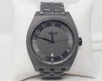 1302: Grey Nixon "The Monopoly " Watch
Measures approx 43.4mm Does not tick