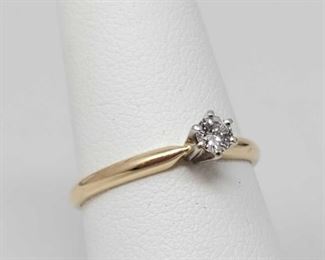 1000: 	
14k Gold Solitaire Diamond Ring, 1.7g
Diamond is approx .25ct, approx size 7, weighs approx 1.7g