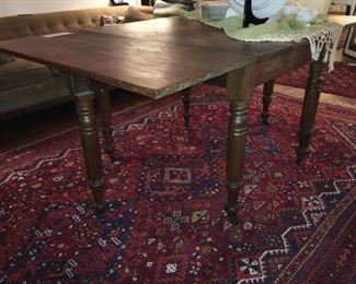 Solid wood drop-leaf table with turned legs and one drawer; stand-alone dimension 3’4.5”x2’7”. Leaf dimension 3’4.5”x1’5” each.