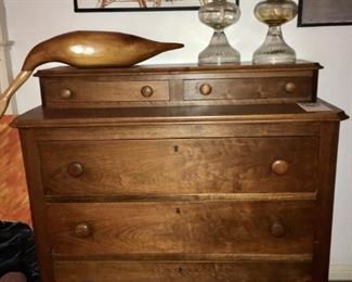 Antique walnut chest, c. 1800. Goose sculpture, 1999, signed by Manfred Thurman.