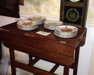 Drop-leaf serving table with 2 drawers, solid wood, on wheels. Dartmouth clock.